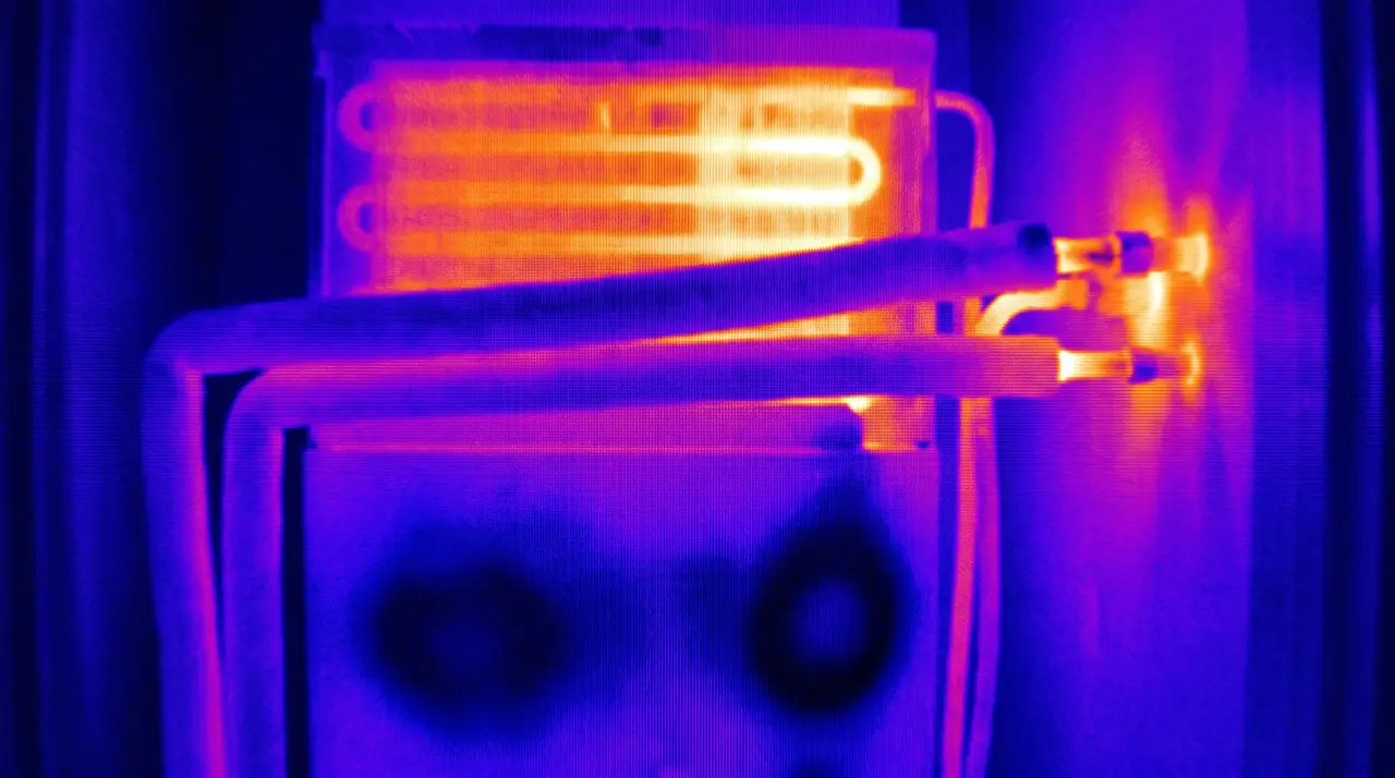 A thermal camera image showing heat distribution across an air handler and its lines
